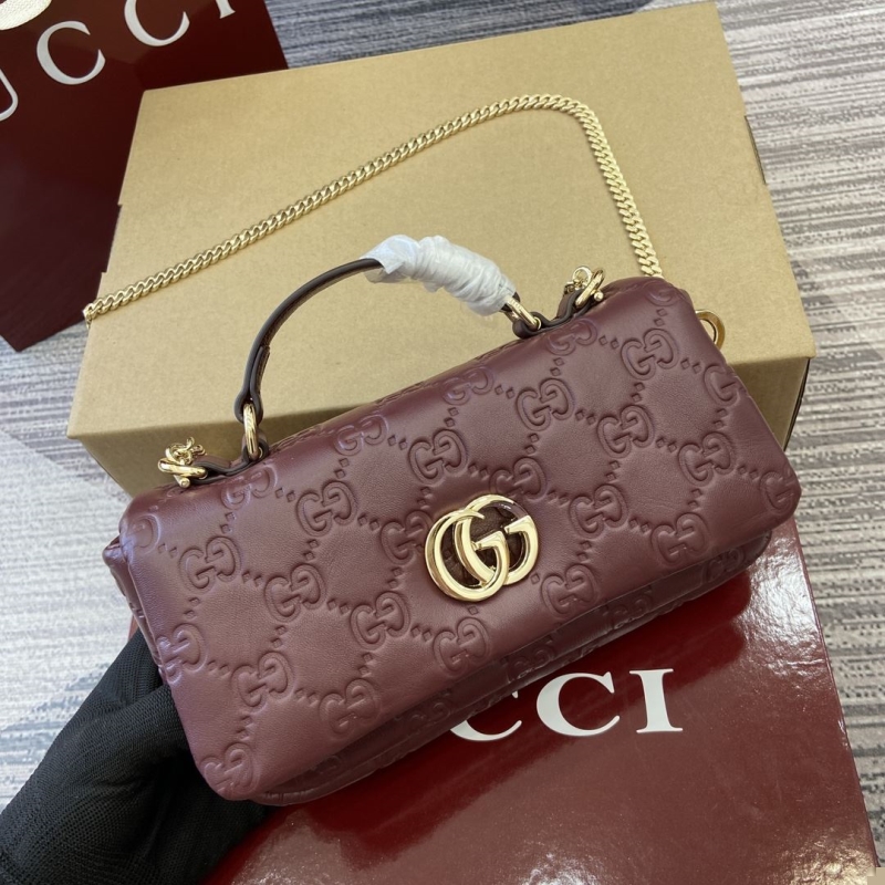 G*u*i top handle bags